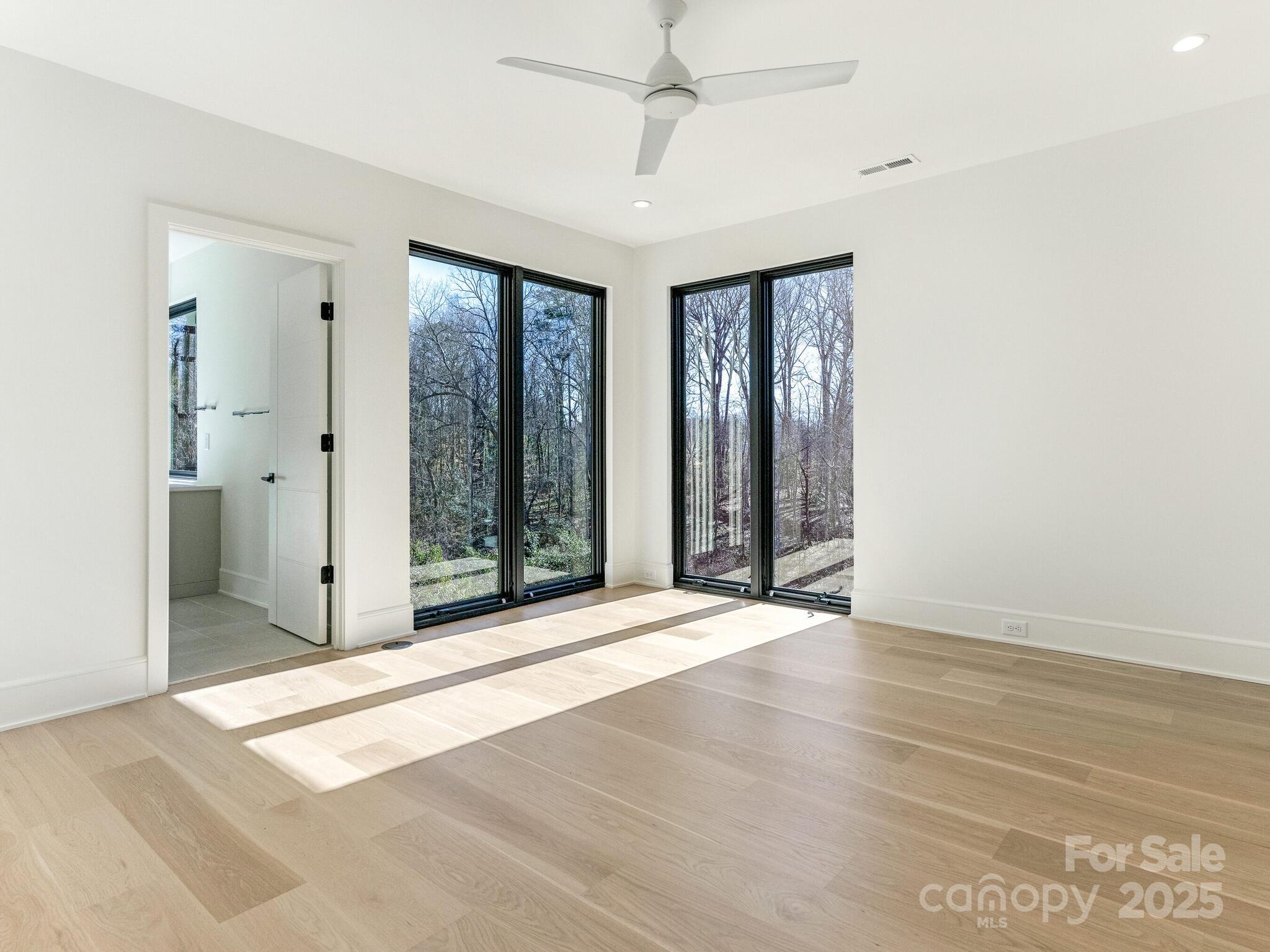 2832 Arcadia Avenue Charlotte, NC 28209 - Photo 26 of 48 a view of an empty room with glass door