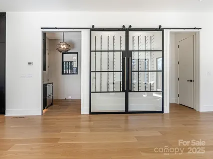 a view of staircase with white walls