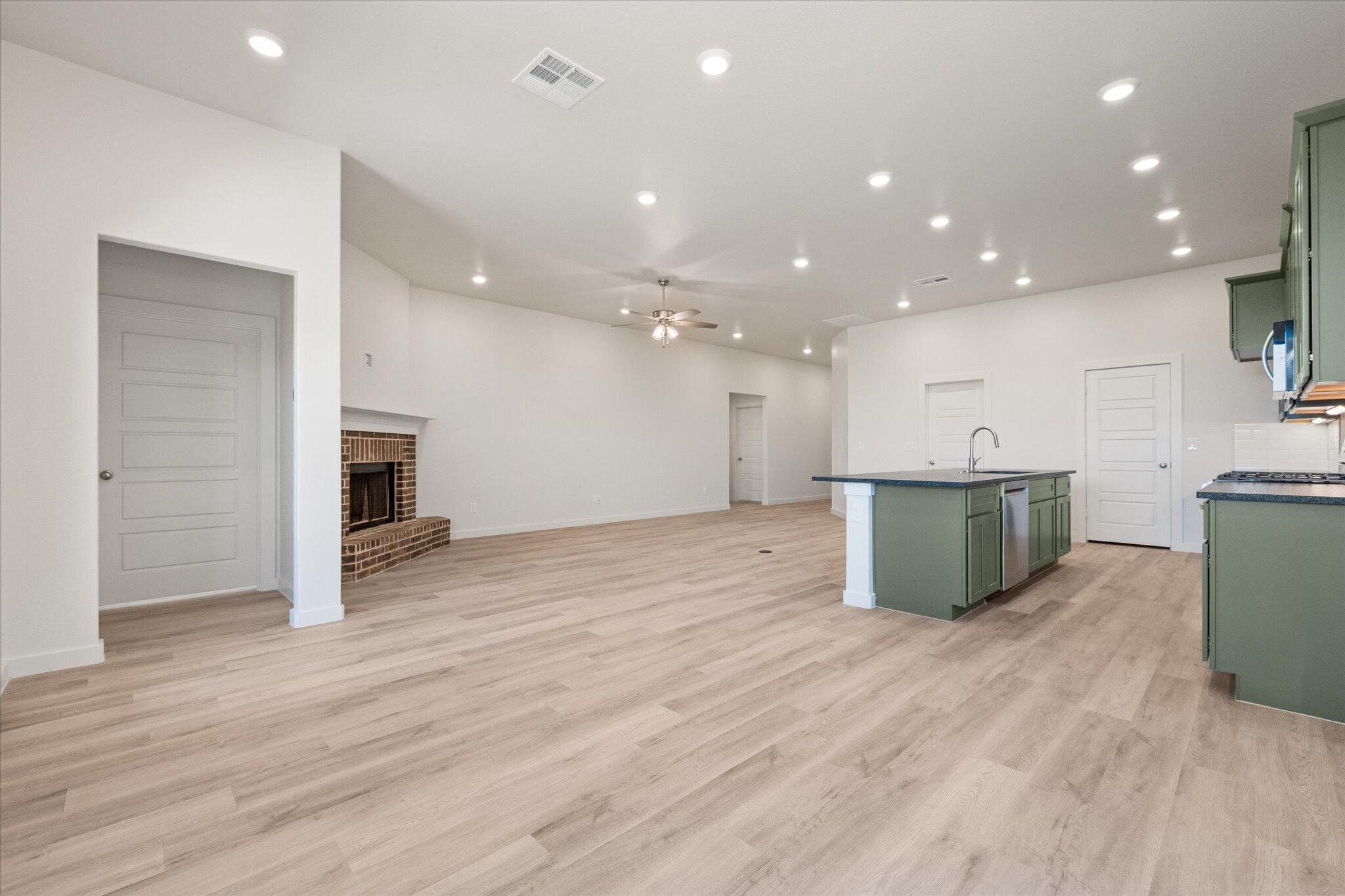 6105 121st Street Lubbock, TX 79424 - Photo 8 of 24 a view of kitchen with cabinets and stainless steel appliances