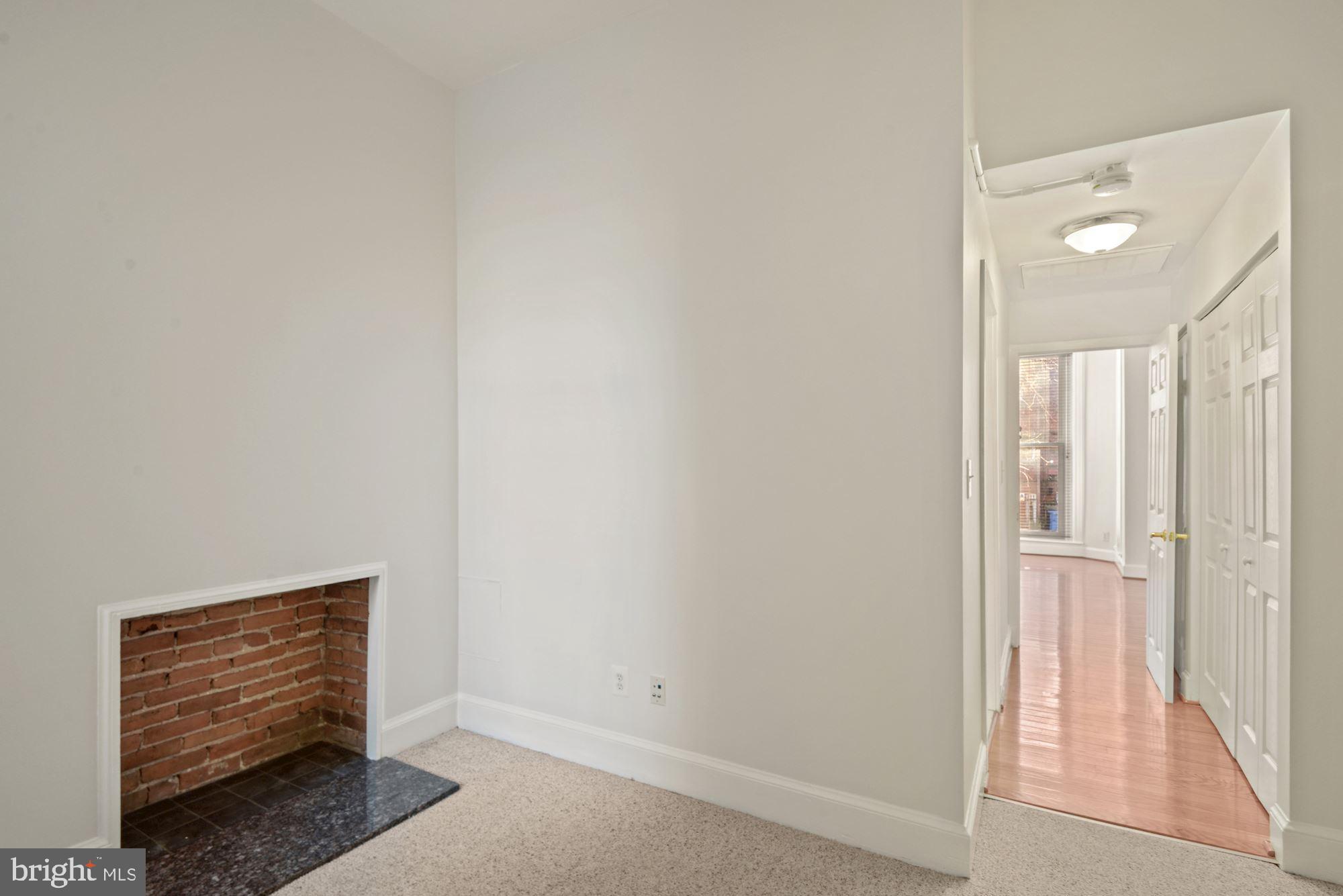 1305 P Street Northwest, Unit 1 Washington, DC 20005 - Photo 15 of 22 Bedroom with another faux fireplace!