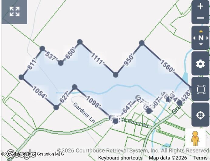 Gravel Pond Road Clarks Summit, PA 18411 - Photo 3 of 11 a picture of a living room with a white bed