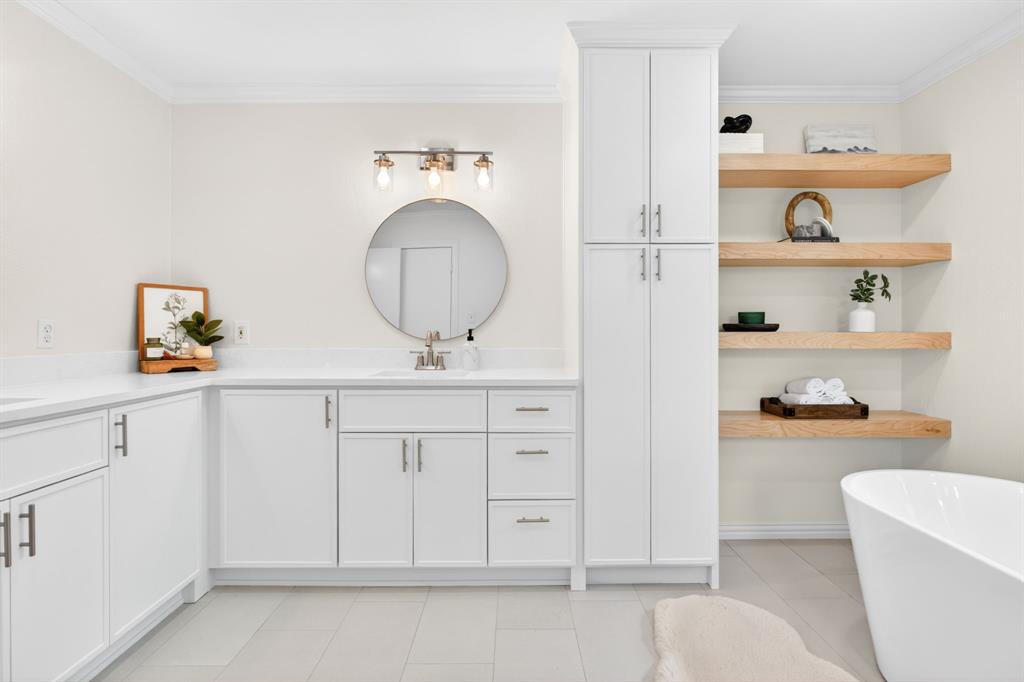 4316 Winding Way Benbrook, TX 76126 - Photo 22 of 40 a bathroom with a sink a toilet and a vanity