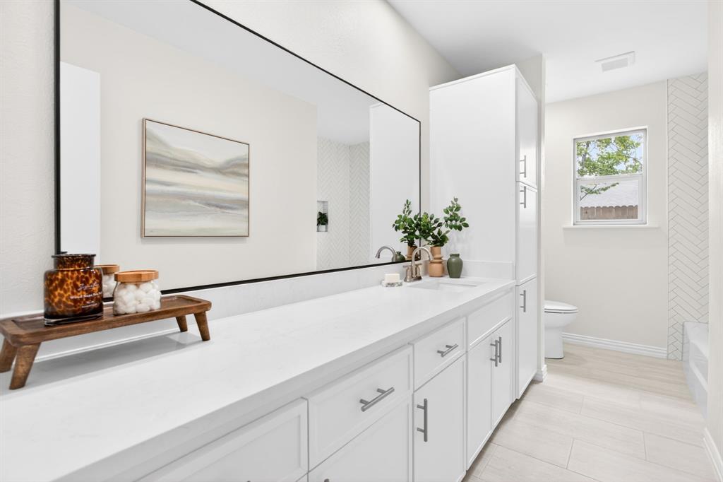 4316 Winding Way Benbrook, TX 76126 - Photo 27 of 40 a bathroom with a sink and a mirror