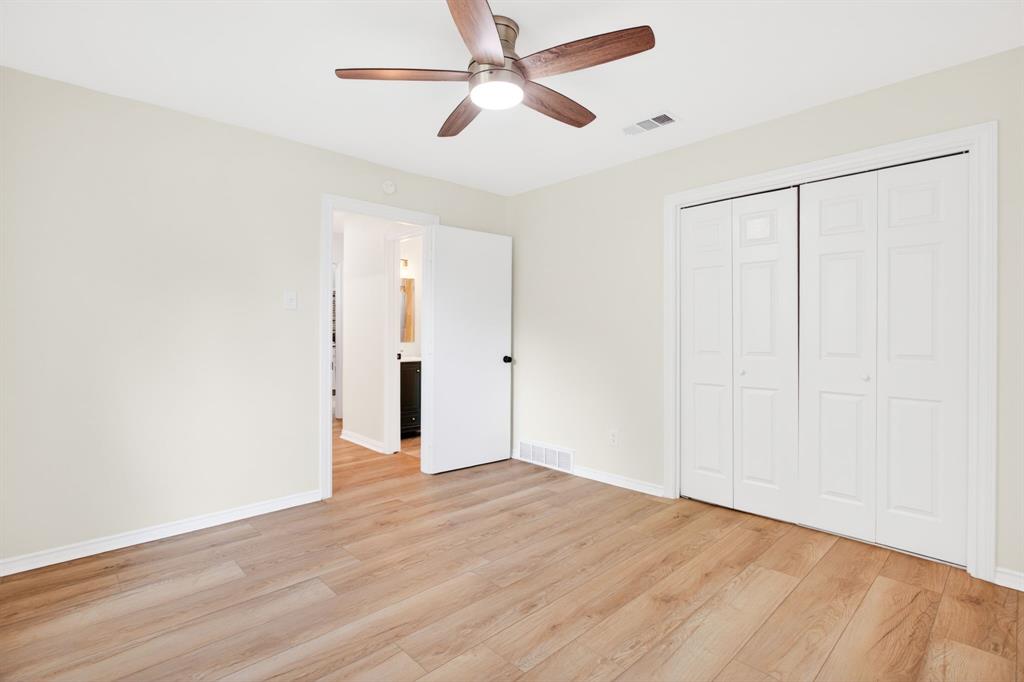 4316 Winding Way Benbrook, TX 76126 - Photo 33 of 40 a view of empty room with wooden floor
