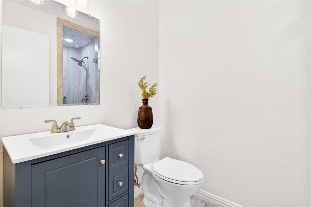 4316 Winding Way Benbrook, TX 76126 - Photo 34 of 40 a bathroom with a sink and a toilet