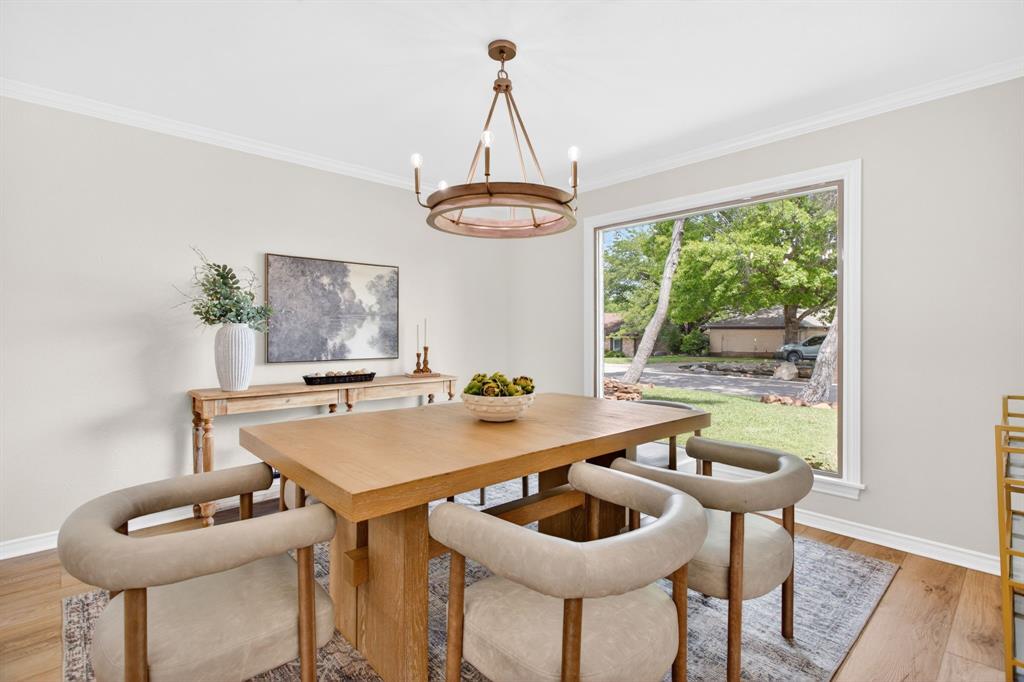4316 Winding Way Benbrook, TX 76126 - Photo 7 of 40 a table and chairs in a room