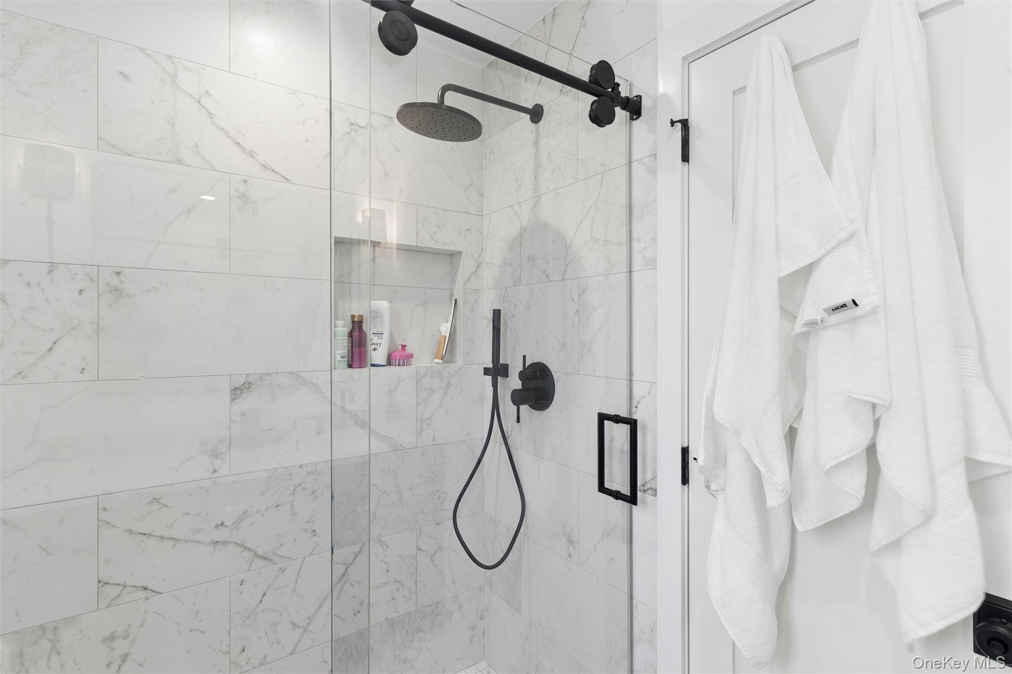 502 Springs Fireplace Road East Hampton, NY 11937 - Photo 19 of 25 a bathroom with a shower