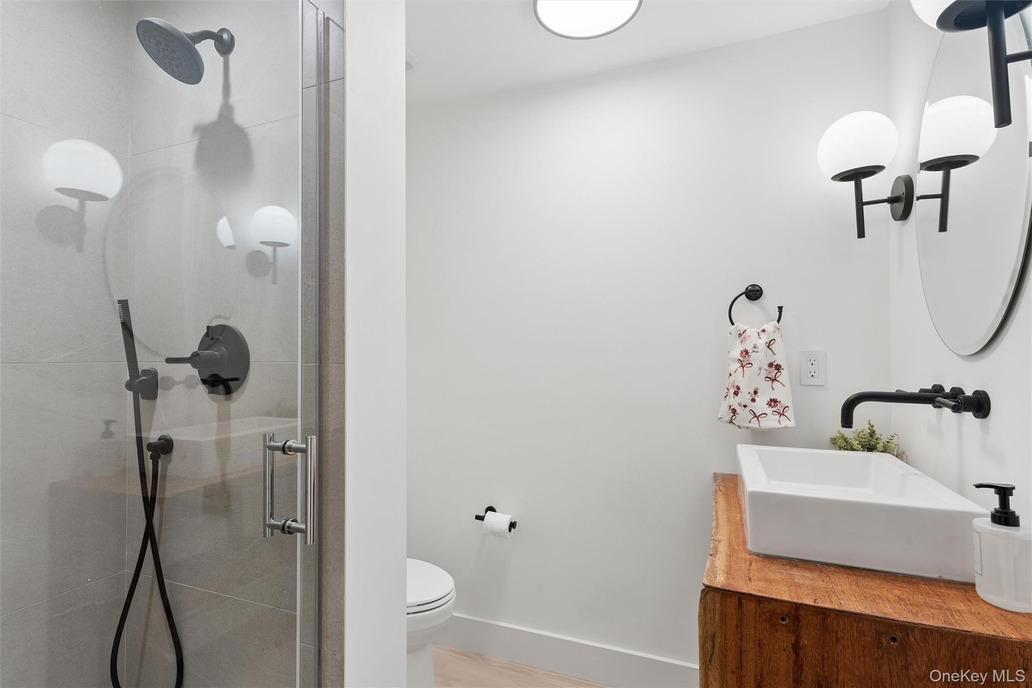 502 Springs Fireplace Road East Hampton, NY 11937 - Photo 24 of 25 a bathroom with a sink