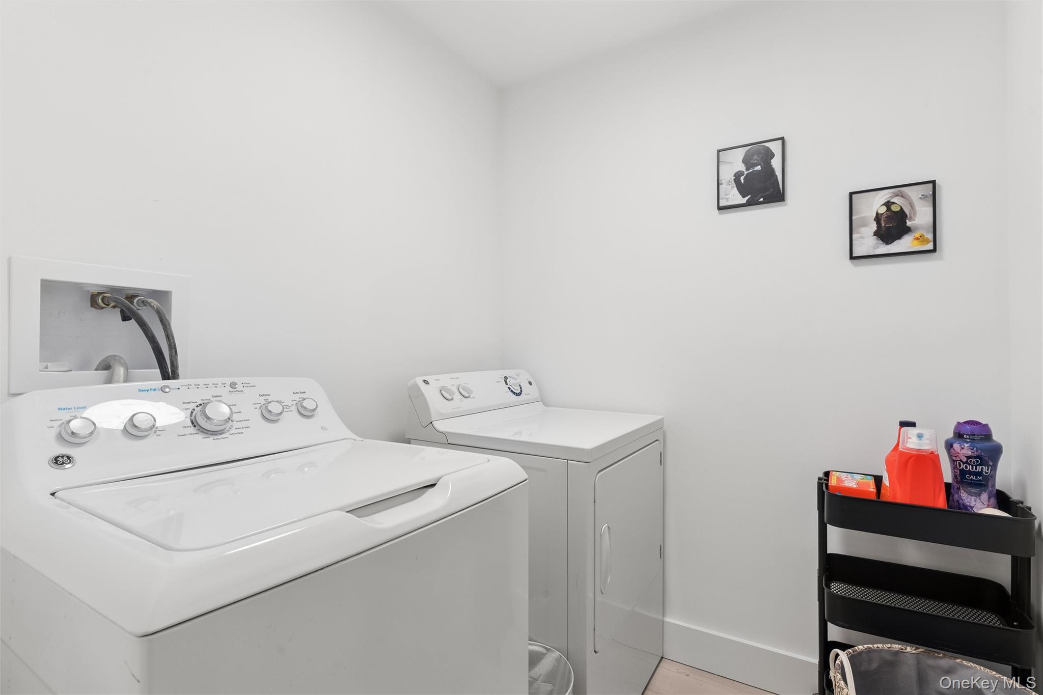 502 Springs Fireplace Road East Hampton, NY 11937 - Photo 25 of 25 a utility room with dryer and washer