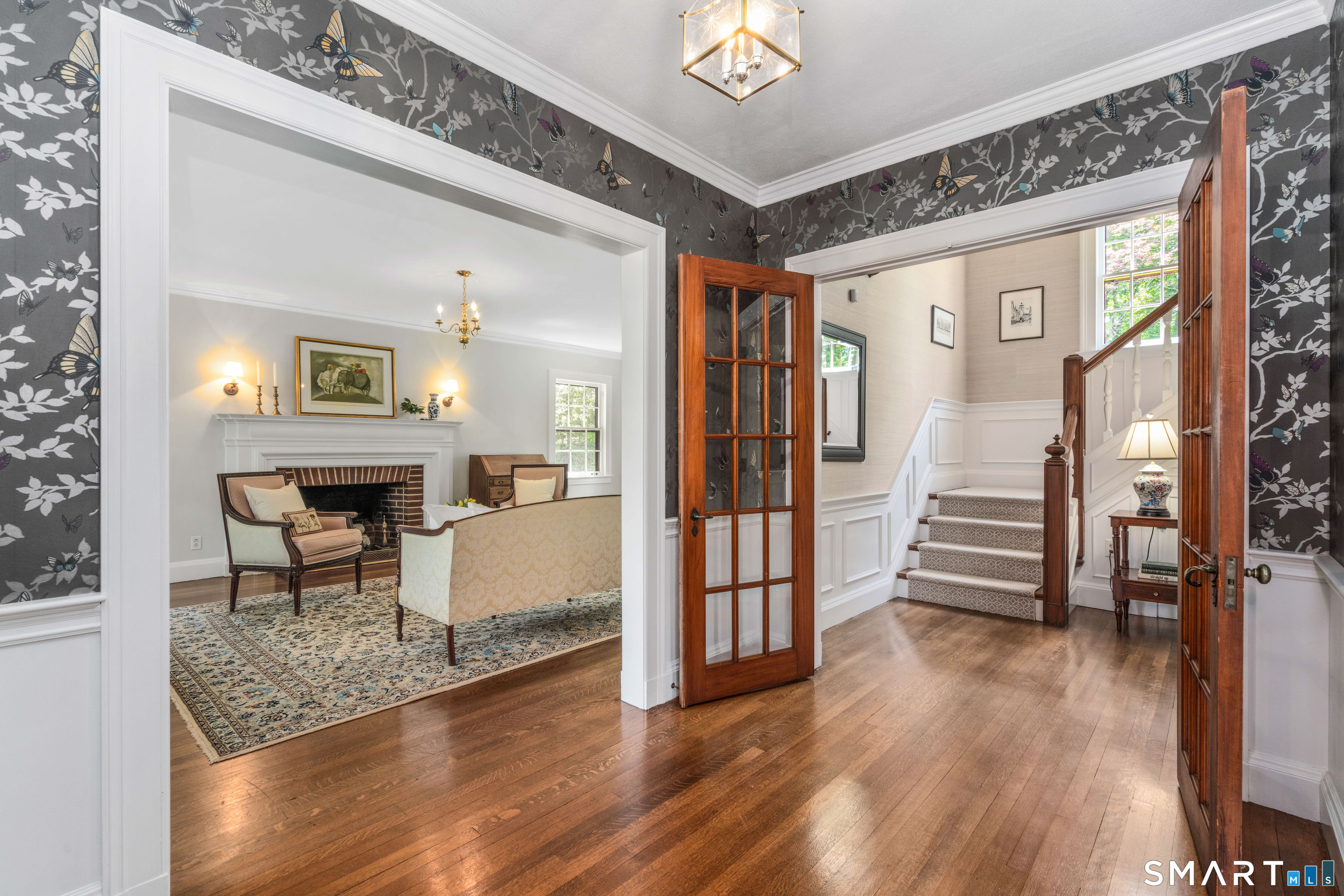 7 Fernwood Road West Hartford, CT 06119 - Photo 4 of 40 a view of a livingroom with furniture and a floor to ceiling window