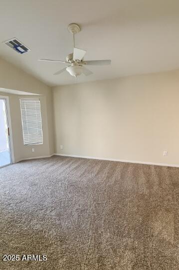 23150 West Lasso Lane Buckeye, AZ 85326 - Photo 4 of 10 an empty room with windows
