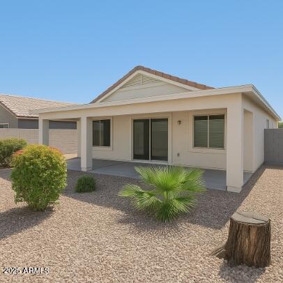 23150 West Lasso Lane Buckeye, AZ 85326 - Photo 10 of 10 a front view of a house with garden