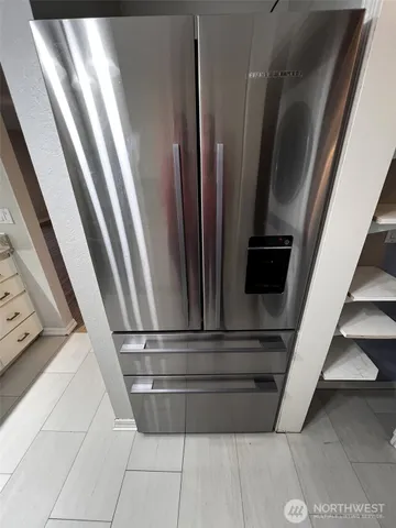 a view of a washer and dryer in a utility room