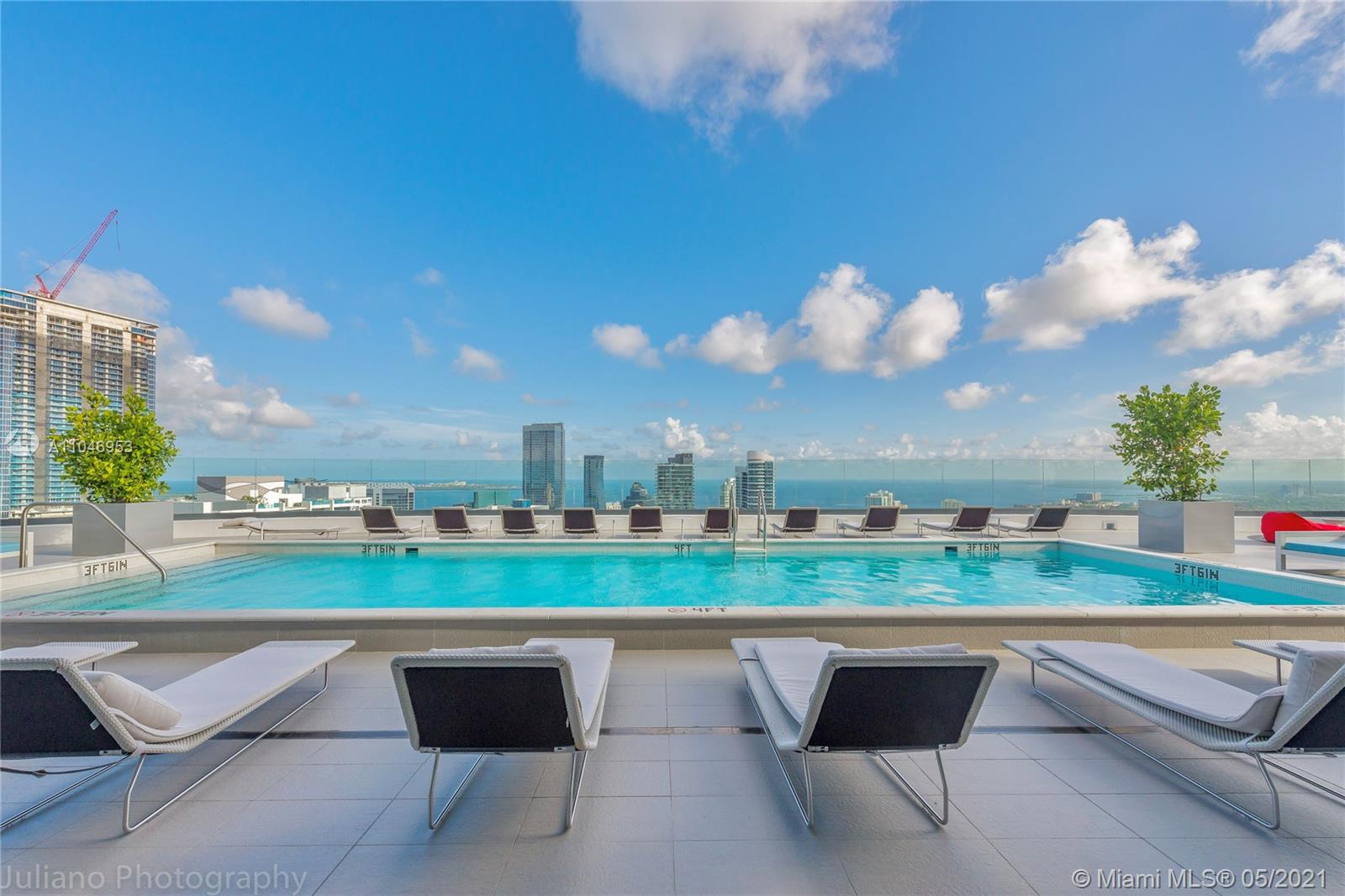 45 Southwest 9th Street, Unit 4204 Miami, FL 33130 - Photo 28 of 66 a view of a terrace with outdoor space