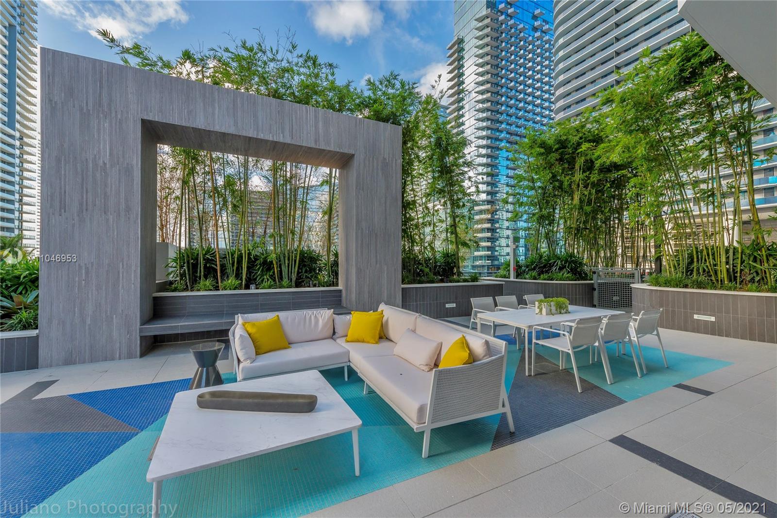 45 Southwest 9th Street, Unit 4204 Miami, FL 33130 - Photo 53 of 66 a view of swimming pool with outdoor seating and plants