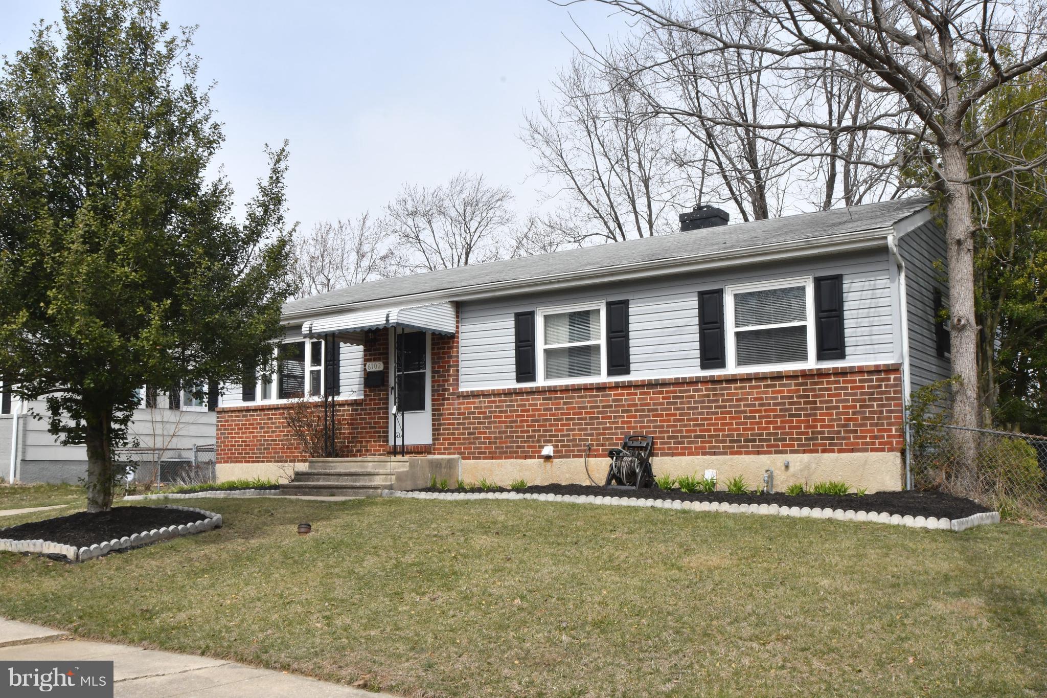 6102 Chanceford Road Baltimore, MD 21228 - Photo 1 of 30 front view of house with a yard