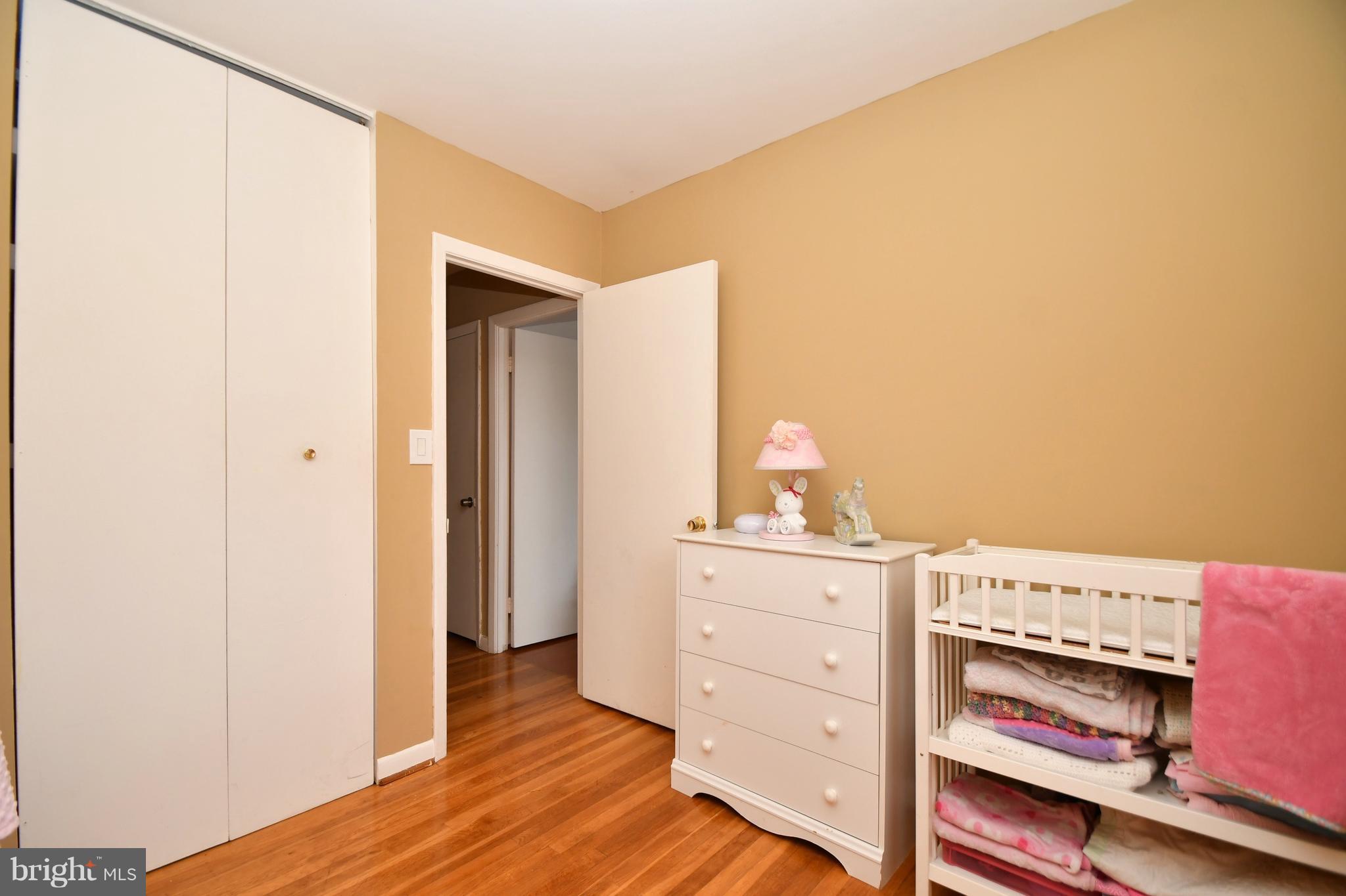 6102 Chanceford Road Baltimore, MD 21228 - Photo 23 of 30 a view of bedroom with wooden floor