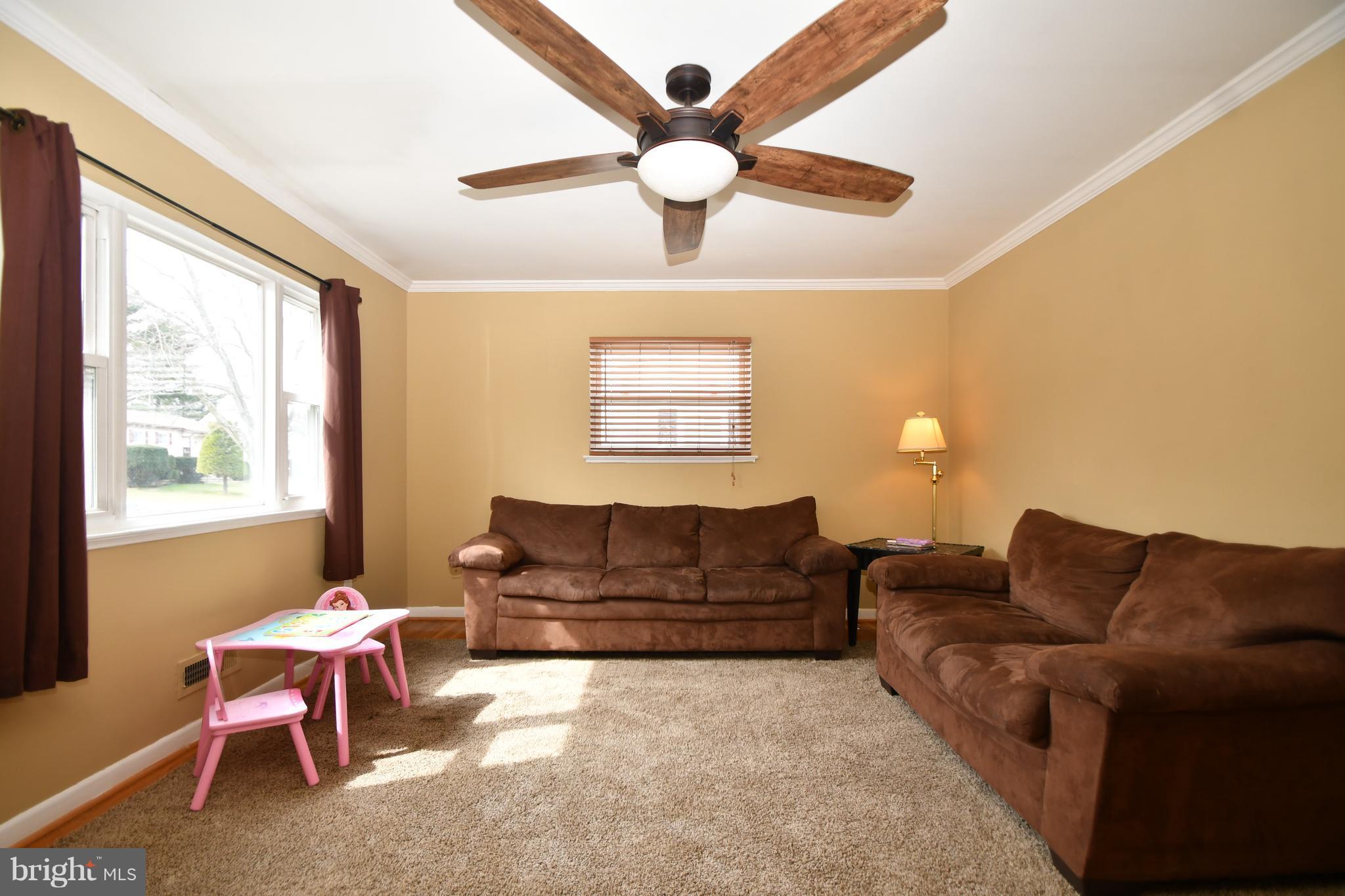 6102 Chanceford Road Baltimore, MD 21228 - Photo 4 of 30 a living room with furniture and a large window