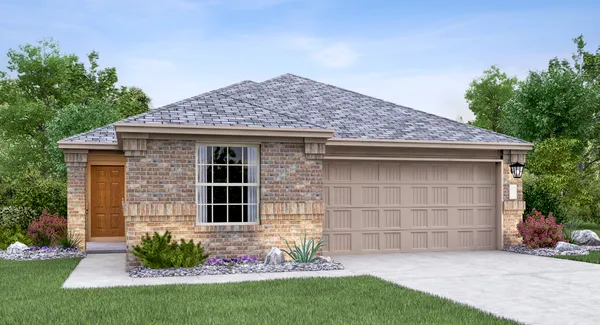 a front view of a house with a garden and yard