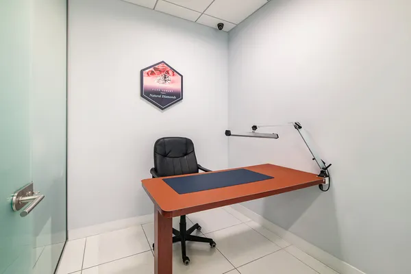 a view of a workspace with furniture