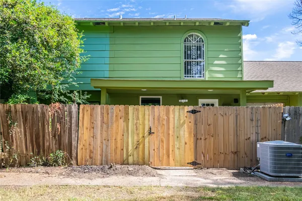 a view of a wooden fence