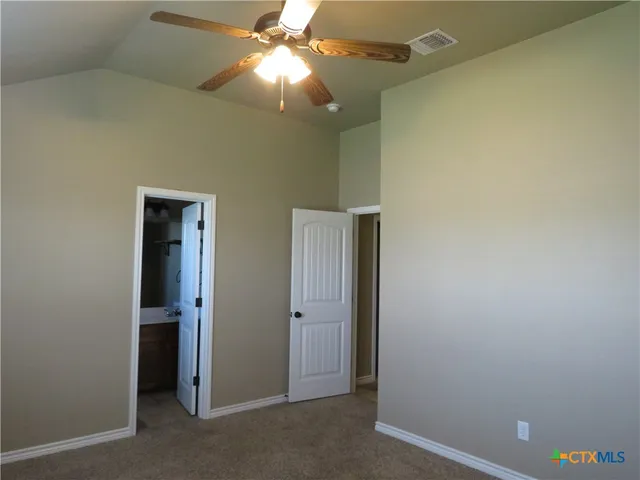 a bathroom with a sink a toilet and bathtub