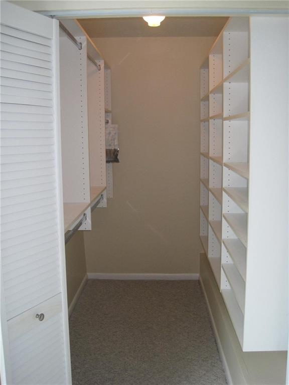 5768 Southeast Windsong Lane Stuart, FL 34997 - Photo 12 of 15 a view of walk in closet
