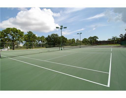 5768 Southeast Windsong Lane Stuart, FL 34997 - Photo 3 of 15 a view of a tennis court