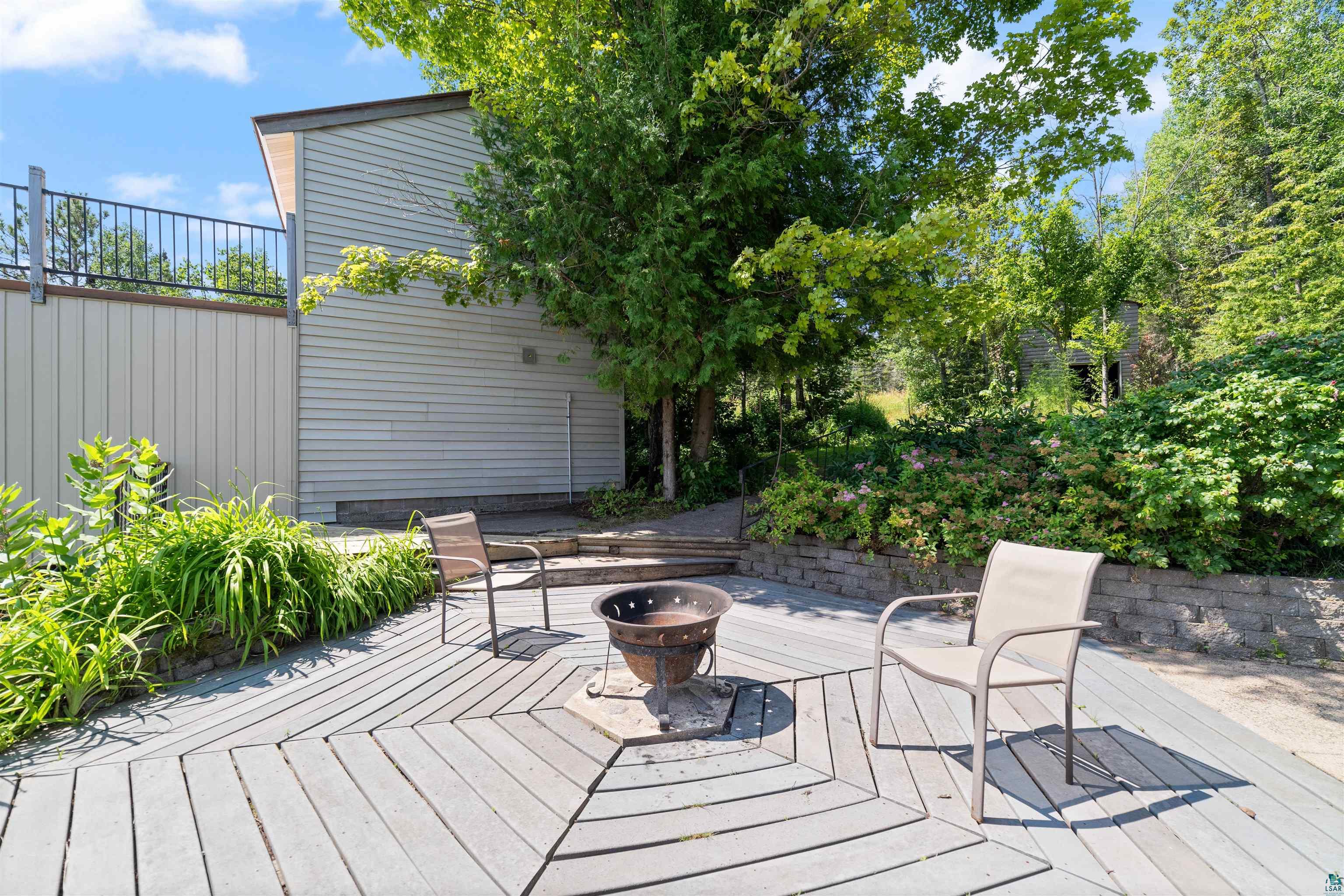 5235 Lakewood Road Duluth, MN 55804 - Photo 22 of 37 Deck with an outdoor fire pit