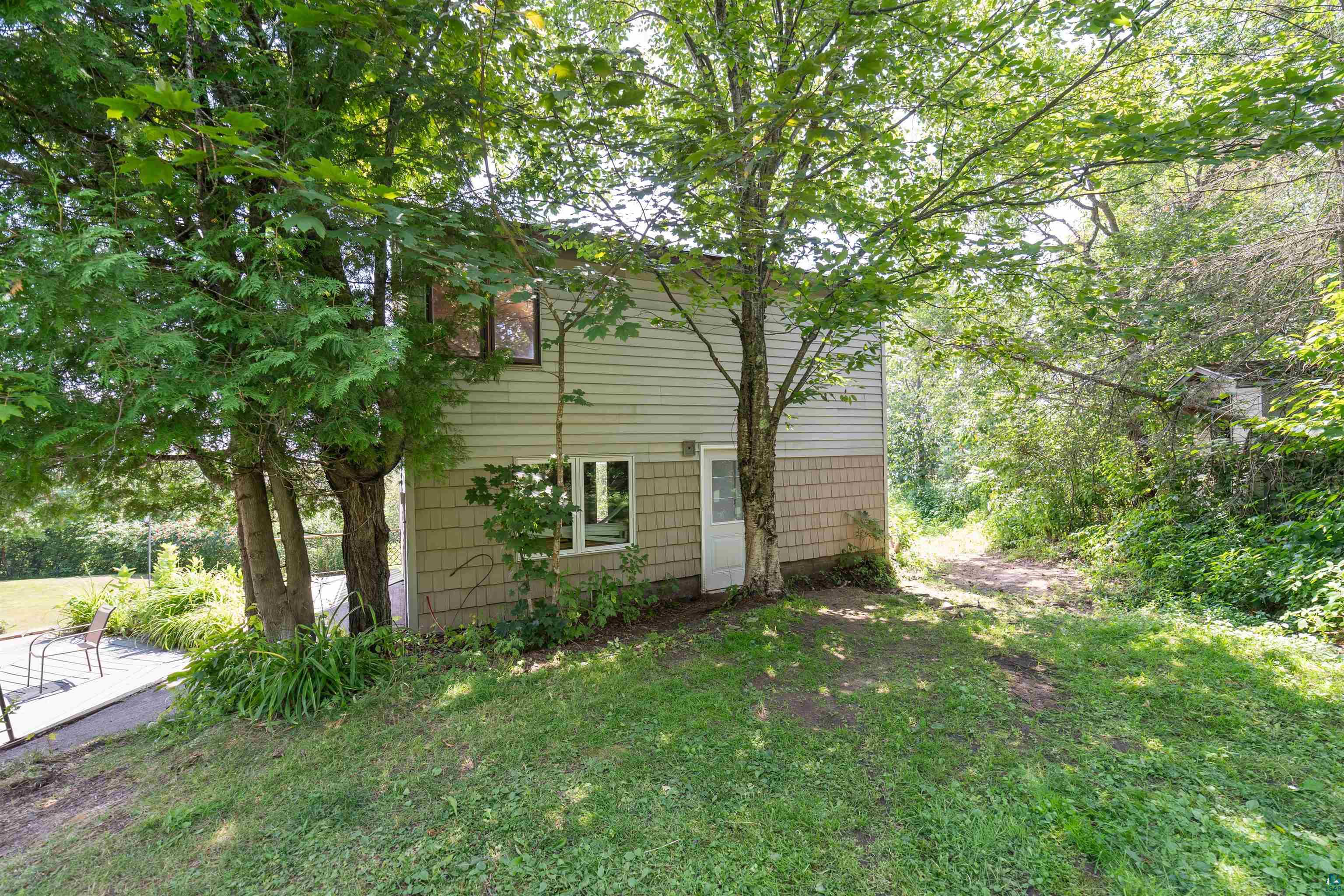 5235 Lakewood Road Duluth, MN 55804 - Photo 24 of 37 View of side of home with a yard