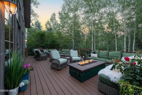 a outdoor living space with furniture and garden view