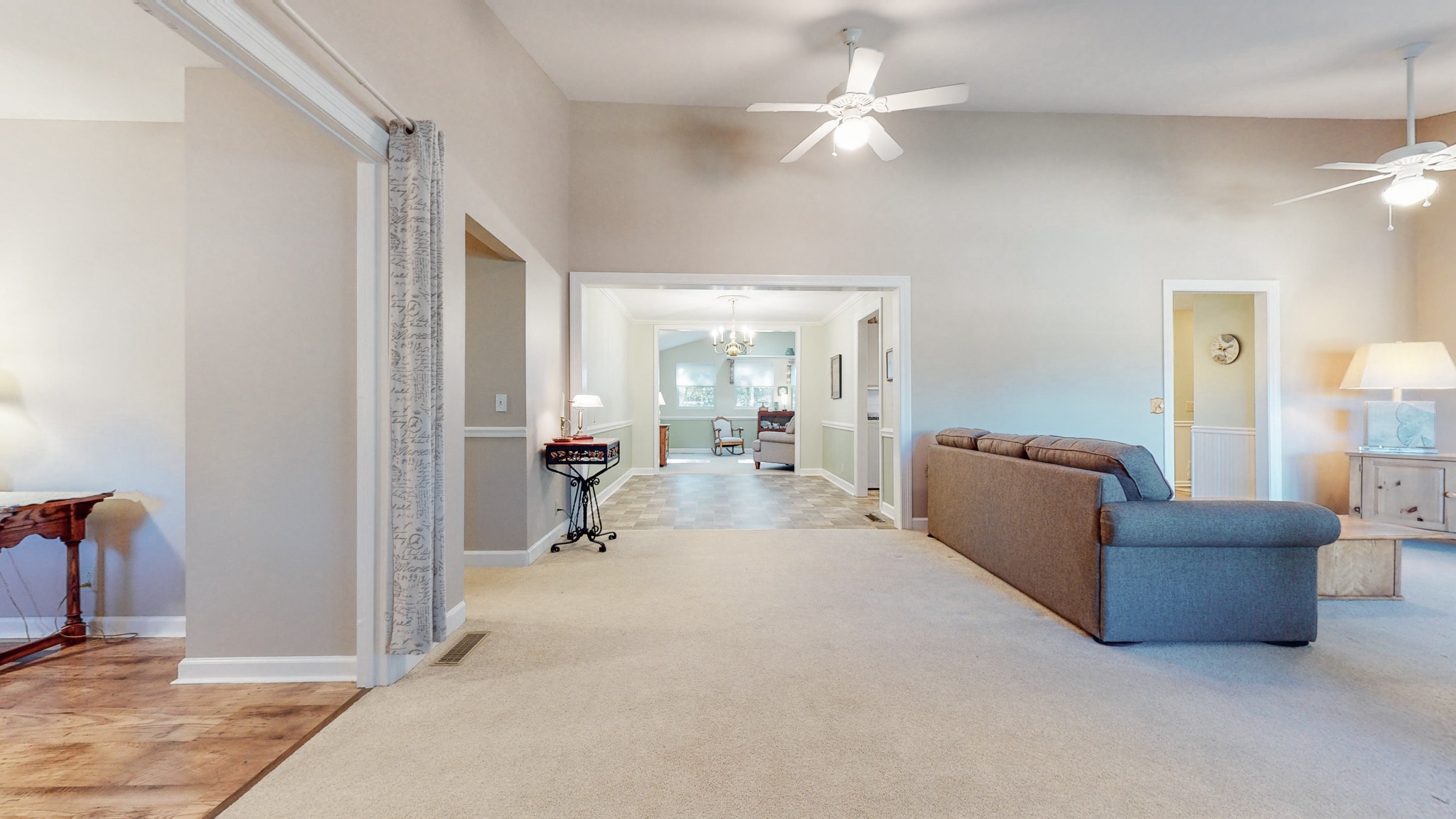 5510 Vanderbilt Road Old Hickory, TN 37138 - Photo 15 of 38 a living room with furniture and a chandelier