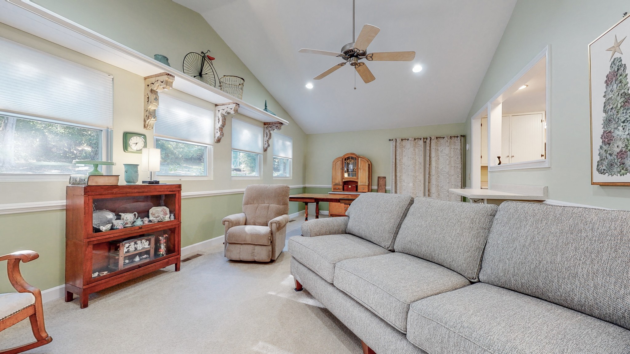 5510 Vanderbilt Road Old Hickory, TN 37138 - Photo 27 of 38 a living room with furniture and a book shelf