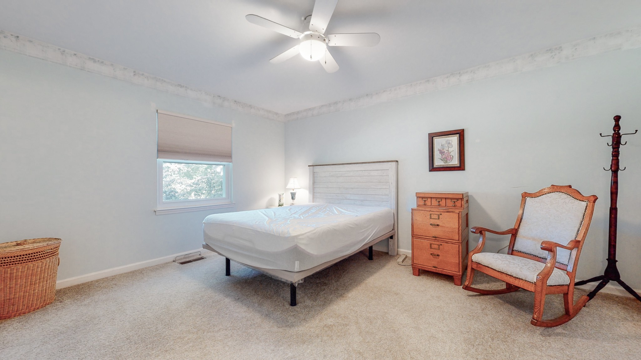 5510 Vanderbilt Road Old Hickory, TN 37138 - Photo 31 of 38 a bedroom with a bed and a chair