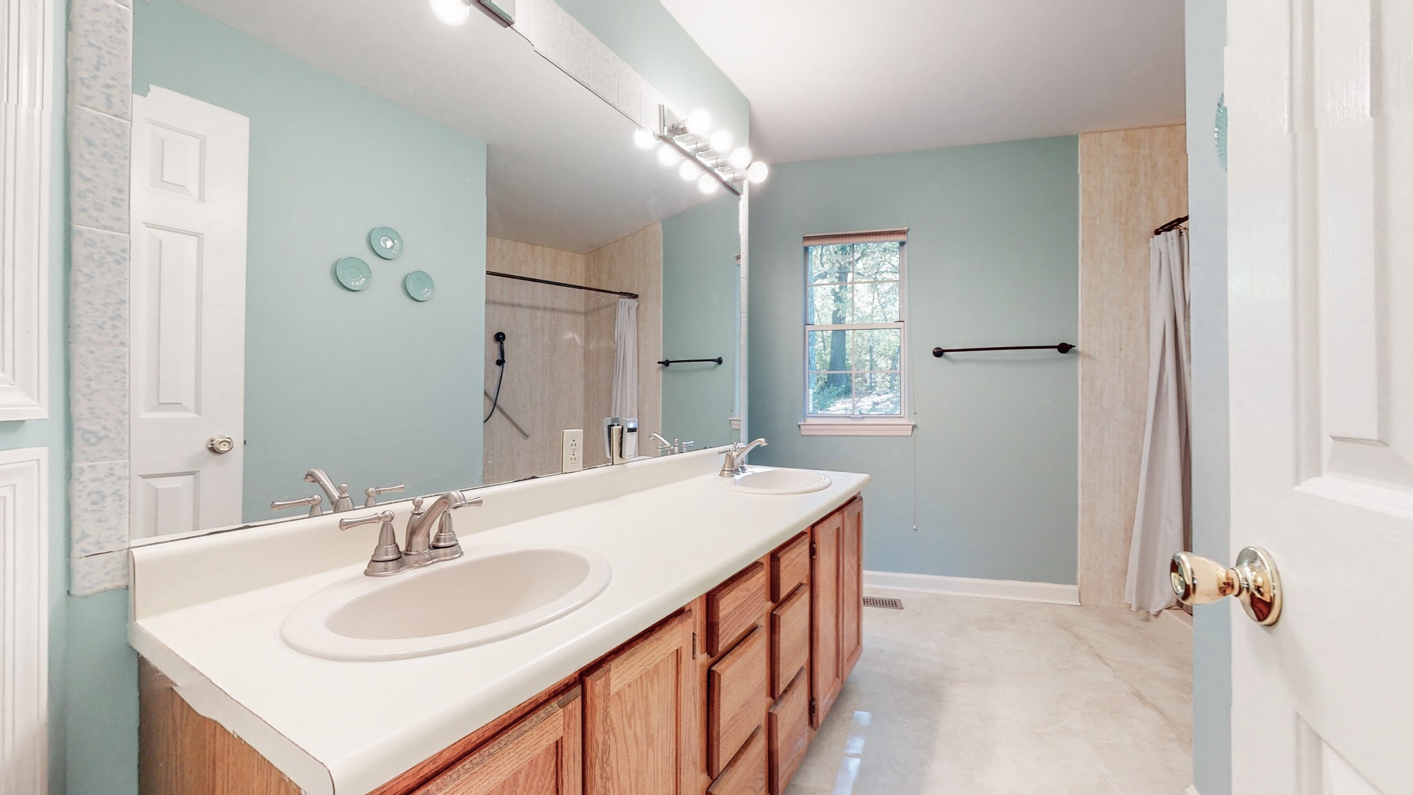 5510 Vanderbilt Road Old Hickory, TN 37138 - Photo 35 of 38 a bathroom with a sink and a mirror