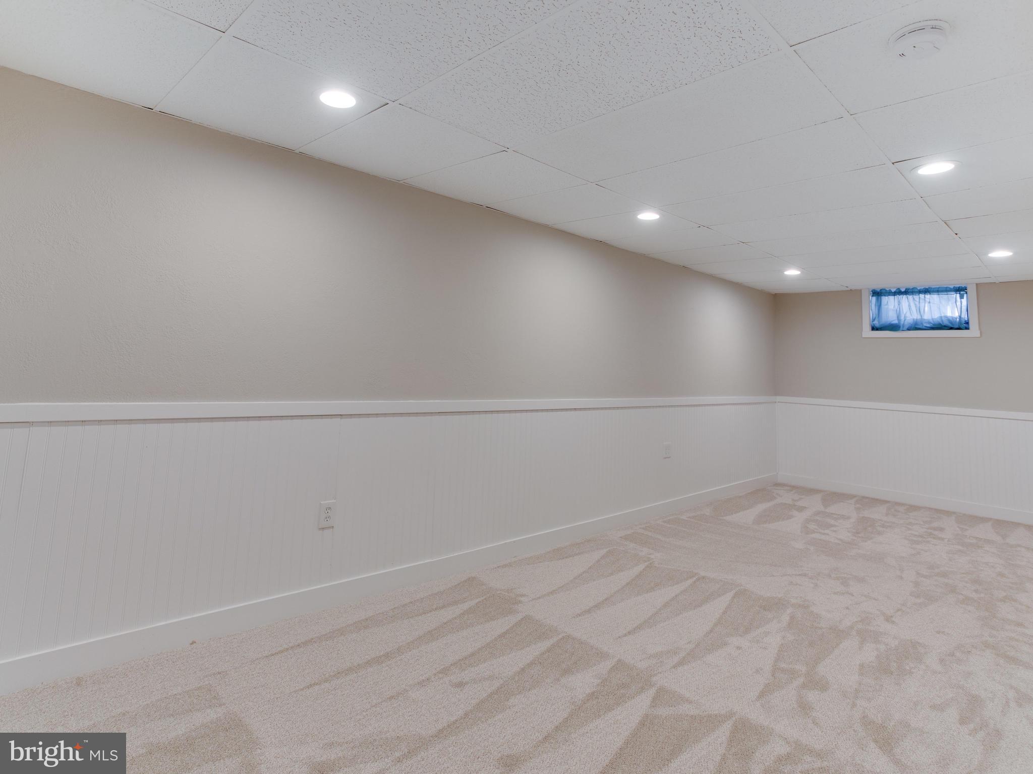 21 Millgate Road Owings Mills, MD 21117 - Photo 27 of 44 Rec Rm- bead board wainscoting