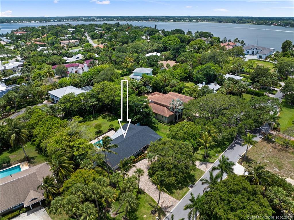 3 Mandalay Road Stuart, FL 34996 - Photo 61 of 65 an aerial view of a house with a garden