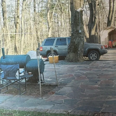 a view of backyard with seating space