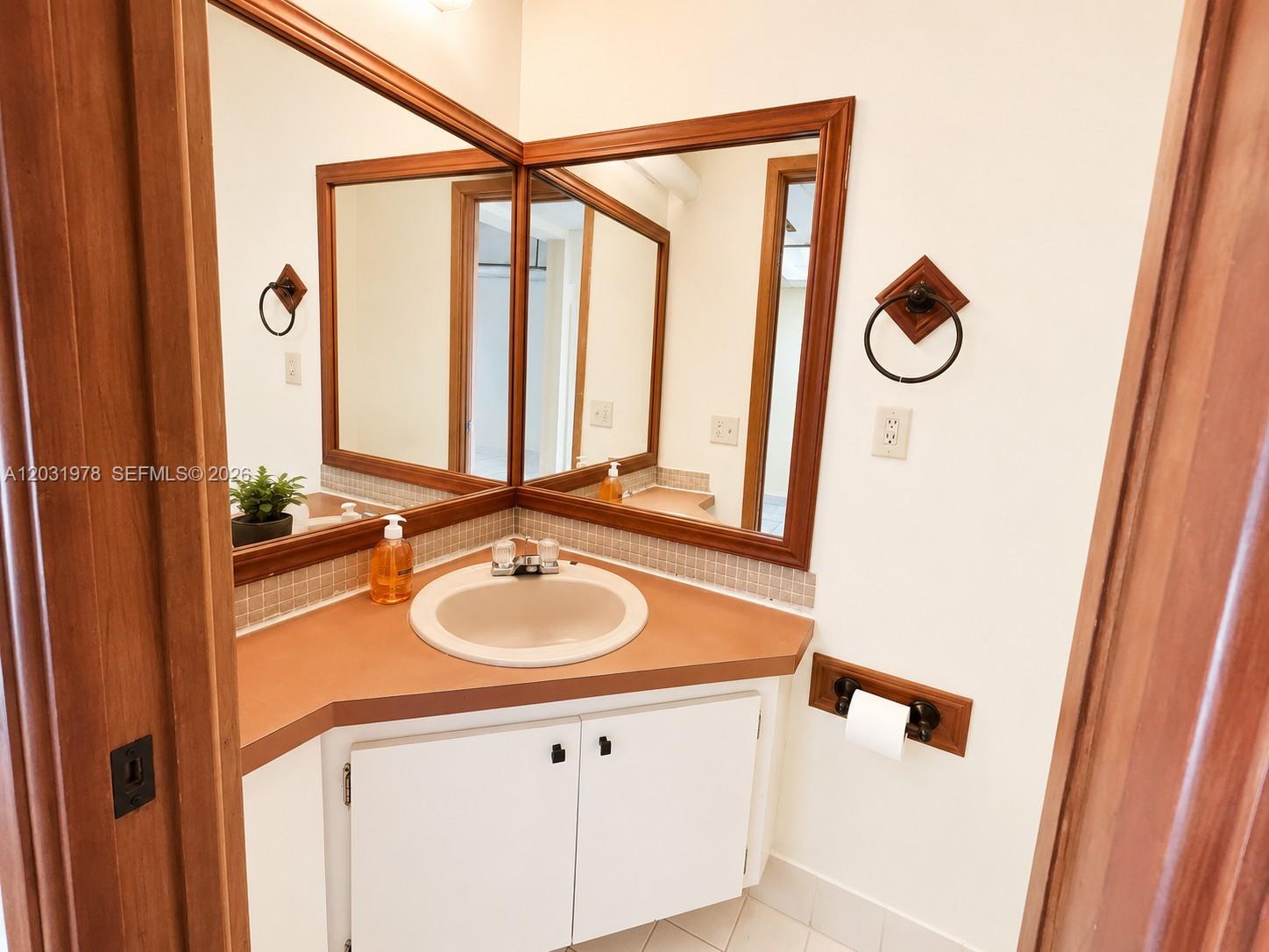 3719 Riverside Drive Coral Springs, FL 33065 - Photo 6 of 19 Half bath downstairs.