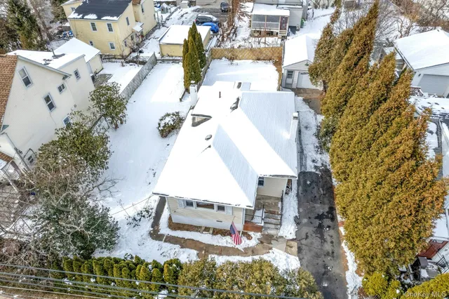 an aerial view of residential building with parking space