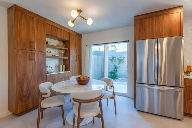 a kitchen with stainless steel appliances a sink and a stove