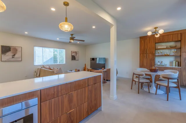 a spacious bedroom with a bed and furniture