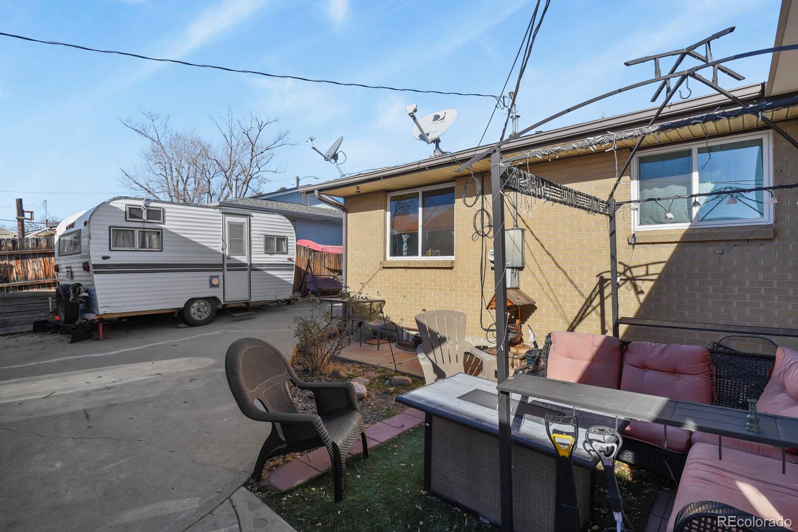 3400 West Mountain Road Englewood, CO 80110 - Photo 21 of 22 a car parked in front of a house