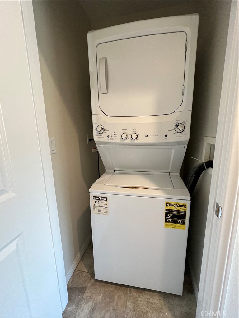 104 Rose Arch Irvine, CA 92620 - Photo 10 of 12 a utility room with dryer and washer