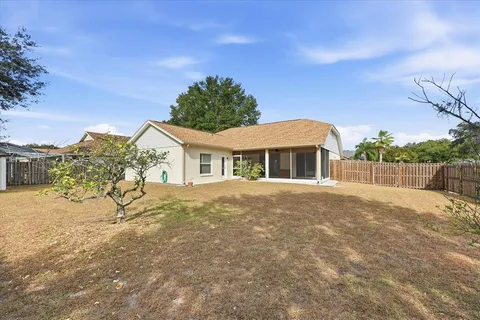 a view of an empty room with a chandelier