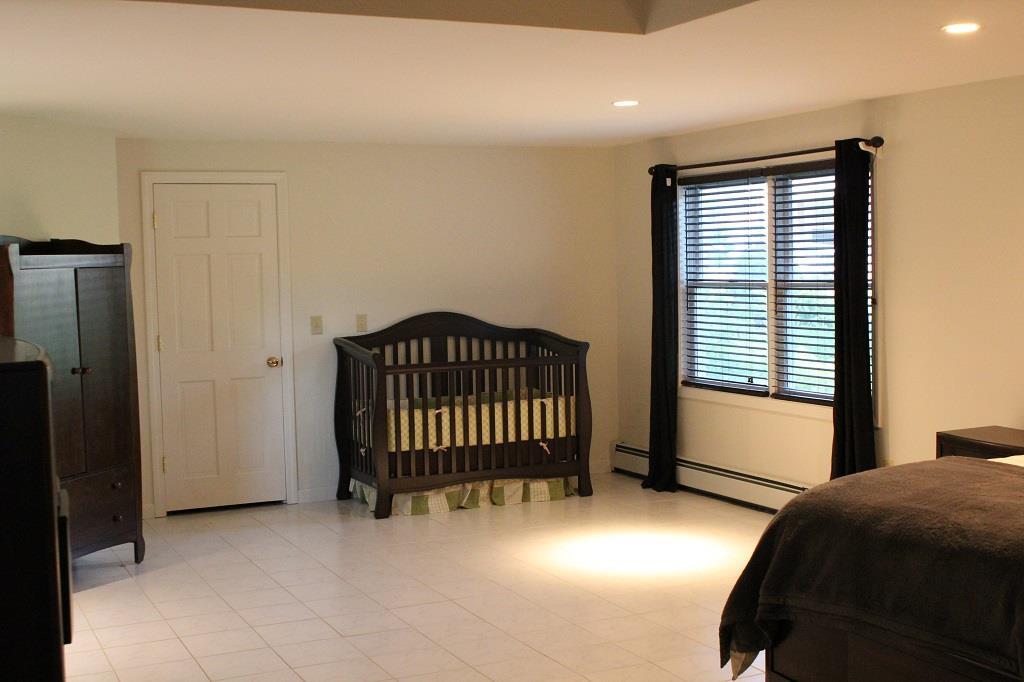 669 N Road Dixmont, ME 04932 - Photo 6 of 25 Part of spacious master bedroom with...