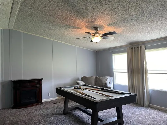 a view of a workspace with furniture