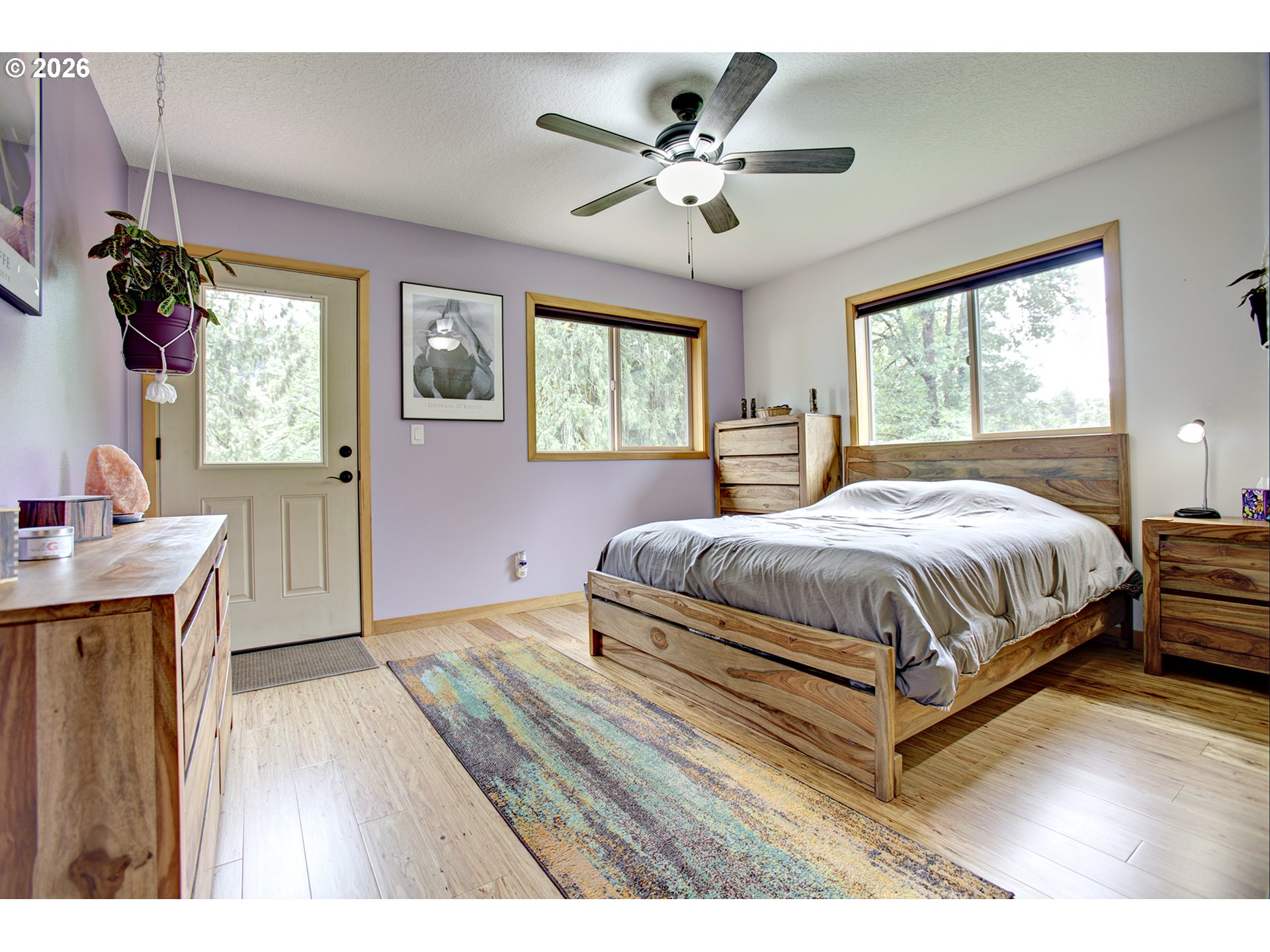 60300 Rays Way St. Helens, OR 97051 - Photo 14 of 41 a bed room with a bed and a chandelier