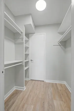 a view of an empty walk in closet