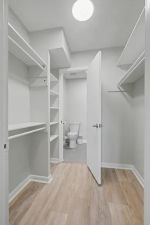 a bathroom with a sink a mirror and vanity